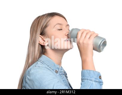Beautiful woman drinking from beverage can on white background Stock Photo