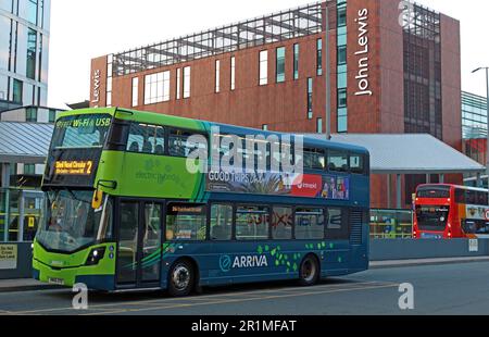 Cleaner, Electric Hybrid, Volvo Arriva bus, at Liverpool One bus station, Paradise Street, Liverpool, Merseyside, England, UK, L1 3EU Stock Photo