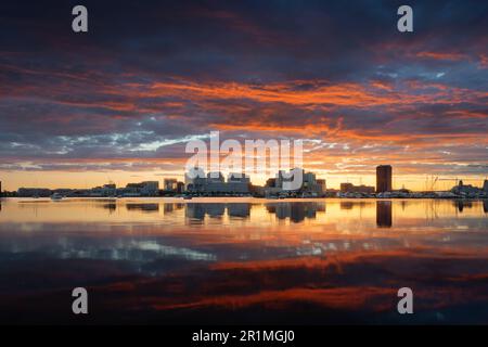 Norfolk, Virginia, USA downtown city skyline with dramatic morning clouds on the Elizabeth River. Stock Photo