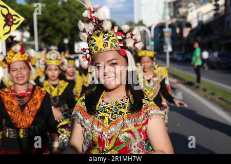 Orang Ulu girl with her community at a parade in Kuching, Sarawak, Malaysia, Borneo. Stock Photo