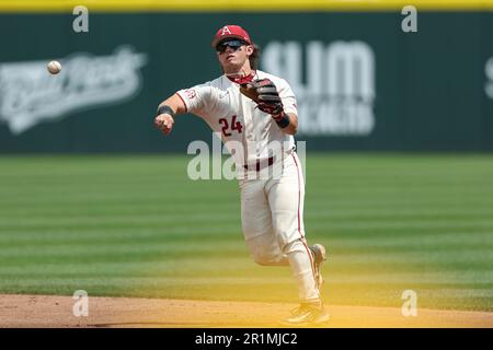 First. 14th May, 2023. Arkansas second baseman Peyton Holt #24 makes a throw over to first. Arkansas defeated South Carolina 5-1 in Fayetteville, AR, Richey Miller/CSM/Alamy Live News Stock Photo