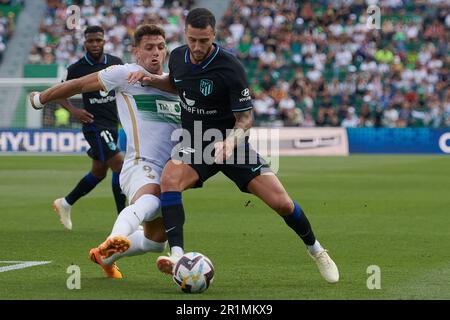 Elche, Spain. 14th May, 2023. Mario Hermoso (R) of Atletico de Madrid vies with Lucas Boye of Elche during the Spanish La Liga football match between Elche CF and Atletico de Madrid in Elche, Spain, May 14, 2023. Credit: Str/Xinhua/Alamy Live News Stock Photo