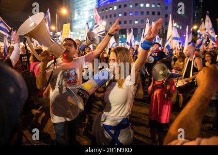 Tel Aviv, Israel. 13th May, 2023. Protesters chant slogans during a protest against the judicial overhaul. Credit: SOPA Images Limited/Alamy Live News Stock Photo