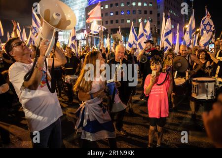 Tel Aviv, Israel. 13th May, 2023. Protesters chant slogans during a protest against the judicial overhaul. Credit: SOPA Images Limited/Alamy Live News Stock Photo