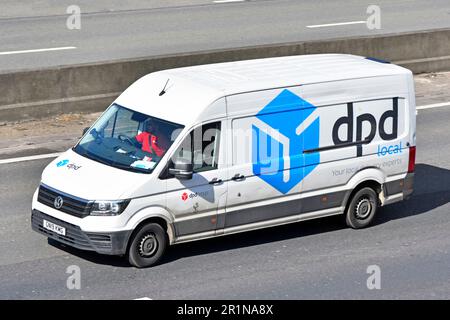 Parcel Delivery UK by DPD Dynamic Parcel Distribution company owned by GeoPost subsidiary of French La Poste using new blue van local in Brentwood UK Stock Photo