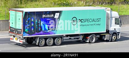 DAF CF white lorry power unit on hgv truck & articulated semi trailer advertising for PCSpecialist a business name configure your own new PC online UK Stock Photo