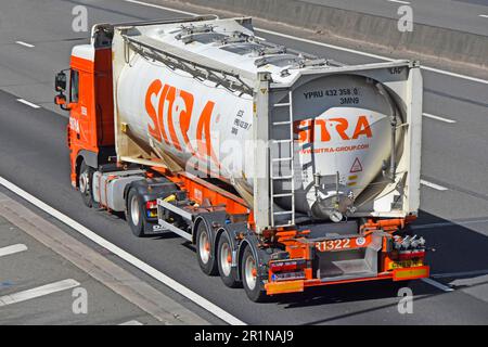 Side back rear aerial view Sitra logo on DAF tanker hgv lorry truck part of a supply chain transport specialist business driving along m25 motorway UK Stock Photo