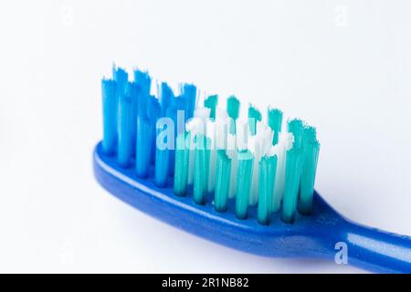 Close up of a Plastic toothbrush head On A white Background Stock Photo