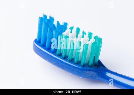 Close up of a Plastic toothbrush head On A white Background Stock Photo