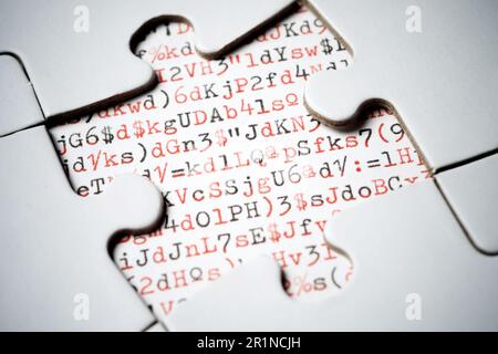 Letters, numbers and signs written with a typewriter in a white puzzle Stock Photo