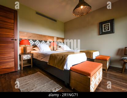 Bedrooms at PAL Savana RESERVE, a safari-like hotel at Le Pal theme park in France. Stock Photo