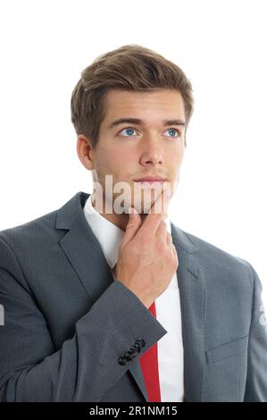 young man lost in thought Stock Photo