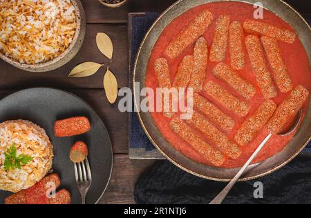Koftet Roz Rice kofta in tomato sauce, a delicious popular dish in Egypt, a blend ...
