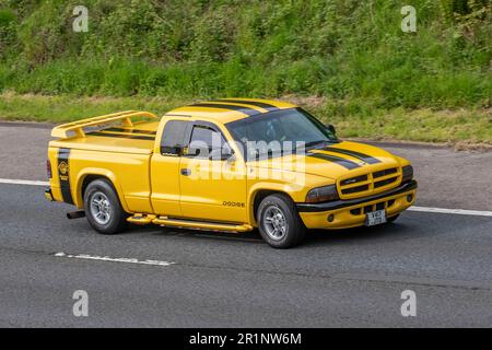 2000 Dodge Yellow LCV Petrol 3900 cc; travelling on the M61 motorway, UK Stock Photo