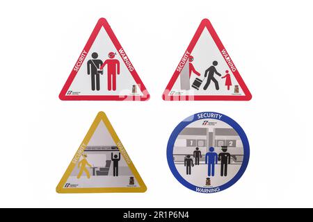 The security warning sign in Milan central railway station Stock Photo