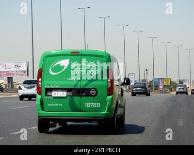 Cairo, Egypt, May 10 2023: Egyptian post delivery truck van mobile car service on the highway road, Egypt post is Egyptian agency responsible for post Stock Photo