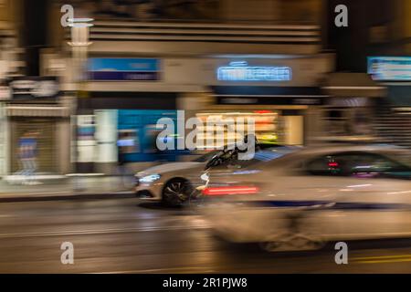 Movement of cars at night time and motorbike, through the street to Tel Aviv Stock Photo