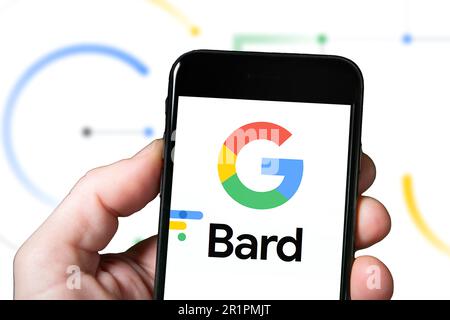 Goggle Bard AI chatbot website homepage. A person with smartphone using Bard Ai website, artificial intelligence. Mobile screen with Bard AI Stock Photo