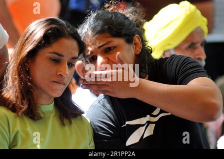 May 15, 2023, New Delhi, Delhi, India: Bhim Sena President Chander Shekhar Azad, Ruling Party Leader Former Union cabient Minister Virendra singh and Indian Medalist Wrestlers Vinesh Phogat and Sakshi Malik adress to media with them during the wrestler press conference on protest against the Brij Bhushan Sharan Singh Ruling goverment party member of Parliamenty and President of Wrestling Federation of India at Jantar Mantar, on May 15, 2023 with others wrestlers and Common person sit on in their protest against WFI president at Jantar Mantar. The protesting wrestlers accused the WFI president Stock Photo