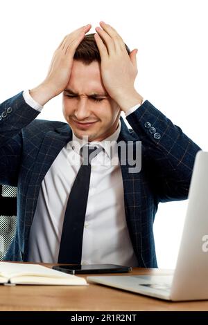 businessman using laptop having problems thinking about troubles Stock Photo