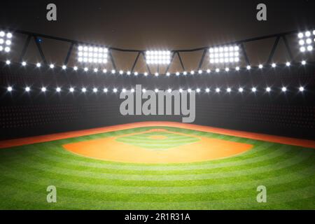 Empty baseball stadium during the night. Freshly cut grass radial pattern and orange dirt in the spotlight. Many lights illuminate the playing field r Stock Photo