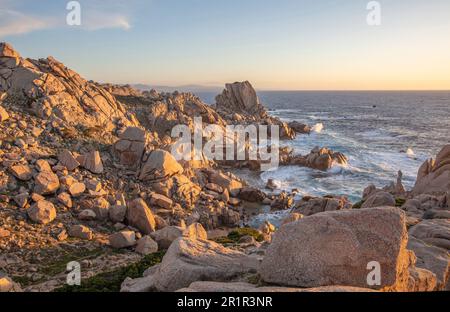Italy, Sardinia, rocky coast, sunset Stock Photo