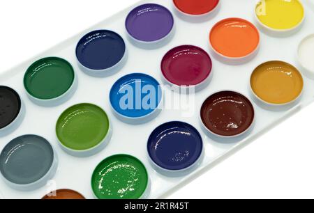 Watercolor paints in box isolated on white background. Watercolor aquarelas package isolated. Paintbox with set of watercolors Stock Photo