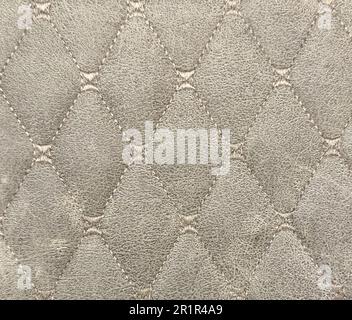 Leather texture. Part of perforated leather details. Leather texture background. Texture, artificial leather with diagonal stitching. Stock Photo