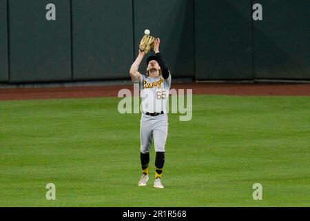 Pittsburgh Pirates center fielder Jack Suwinski looks out of the dugout  before the start of a baseball game against the Miami Marlins, Friday, June  23, 2023, in Miami. (AP Photo/Wilfredo Lee Stock