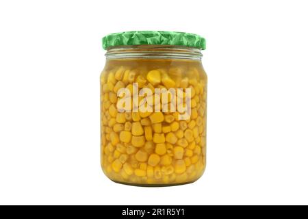 Canned sweet corn in glass can isolated on white background. Pickled corn in jar. Steamed sweet corn seed. Stock Photo
