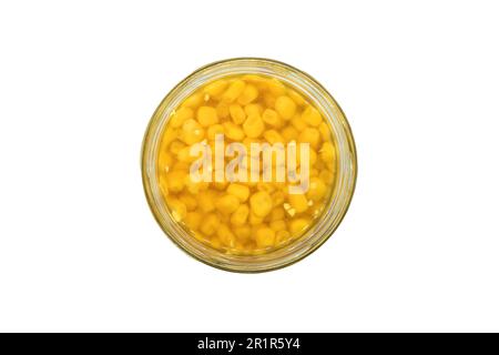 Canned sweet corn in glass can isolated on white background. Pickled corn in jar. Steamed sweet corn seed. Stock Photo