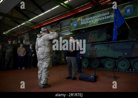 Aachen, Germany. 14th May, 2023. Ukrainian President Volodymyr Zelenskyy, right, presents state awards to Ukrainian soldiers training at Camp Aachen, May 14, 2023 in Aachen, Germany. The Germany Army is training Ukrainian soldiers on military hardware provided by Germany at the base. Credit: Pool Photo/Ukrainian Presidential Press Office/Alamy Live News Stock Photo