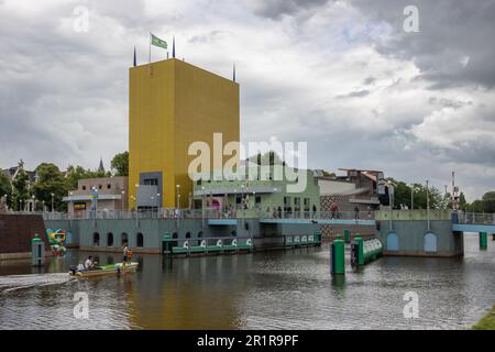 Groningen, The Netherlands - July 7, 2022: Futuristic Museum of modern art near channel in medieval Dutch city Groningen Stock Photo