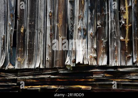 Weathered old barn with warped boards Stock Photo
