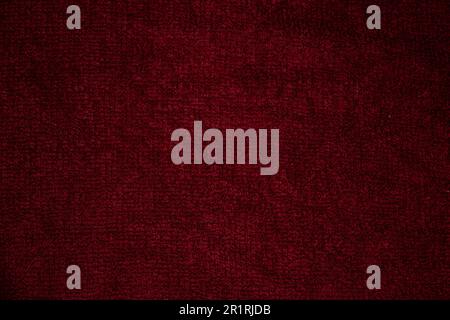 close up, wet deep red towel flat smooth high contrast, heavy texture, shadows, background, abstract, material, textile, fabric Stock Photo