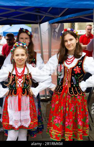 Bedford, Britain, Young Girls in Colourful Traditional Polish Dresses for Polish Heritage Day Event organised by the Polish British Integration Centre Stock Photo