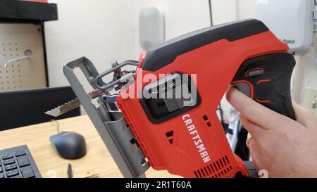 A person's hand adjusts the pressure valve on an Instant Pot pressure cooker,  Lafayette, California, February 8, 2022. Photo courtesy Sftm Stock Photo -  Alamy