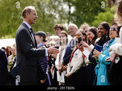 The Duke of Edinburgh talks to guests as he hosts young people from The Duke of Edinburgh's Award scheme in the garden of Buckingham Palace, London. Picture date: Monday May 15, 2023. Stock Photo