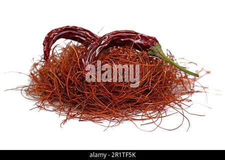 Chilli threads and chilli pod against white background Stock Photo