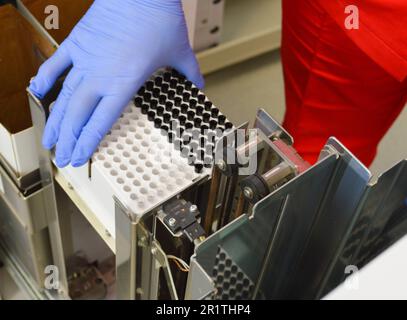 medical research and pharmaceutical research : robotic pipette device. Stock Photo