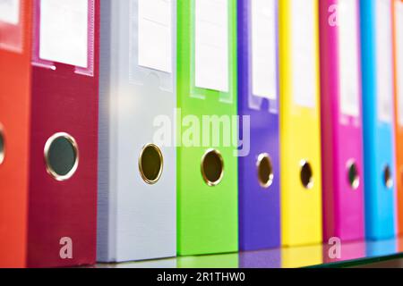 Office folders for documents on shelf Stock Photo