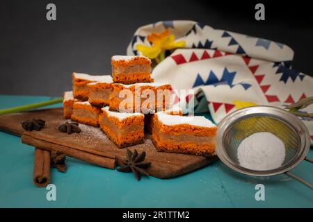 Apple cake pieces, red dough made with tomato paste. side view close up Stock Photo