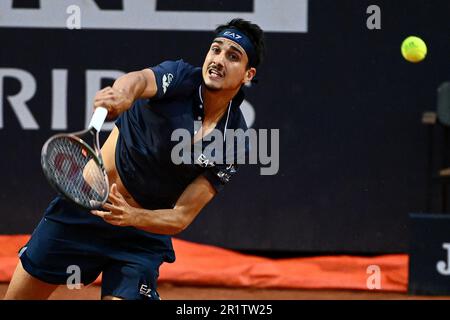 Rome, Italy. 15th May, 2023. Lorenzo Sonego of Italy serves during his match against Stefanos Tsitsipas of Greece at the Internazionali BNL d'Italia tennis tournament at Foro Italico in Rome, Italy on May 15th, 2023. Credit: Insidefoto di andrea staccioli/Alamy Live News Stock Photo