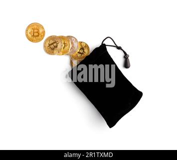 Bitcoins spill out of a black bag on a white background, top view. Concept of cryptocurrency payment and digital money using. Crypto money coin Stock Photo