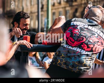 Lisbon, Portugal - May 13, 2023: Arm wresting competition at Figueira Square in Lisbon, Portugal Stock Photo