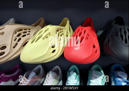New York, USA. 15th May, 2023. Display models of Adidas Yeezy 'Foam Runner  shoes (designed by artist Kanye West) seen at a sneaker store in New York,  NY, Monday May 15, 2023.