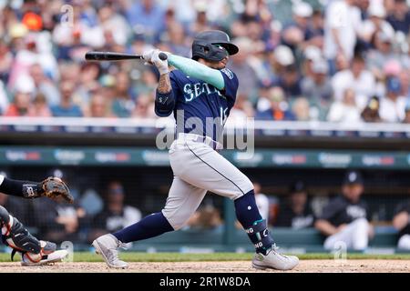 Seattle Mariners second baseman Kolten Wong runs off the field while  wearing an armband for Jackie Robinson Day after the second inning of a  baseball game against the Colorado Rockies, Saturday, April