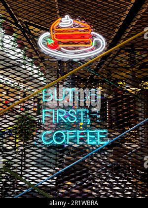 But first coffee and cake. Bright colored collection of symbols sign boards glowing with colorful neon light for cafe, restaurant, motel or cocktail Stock Photo