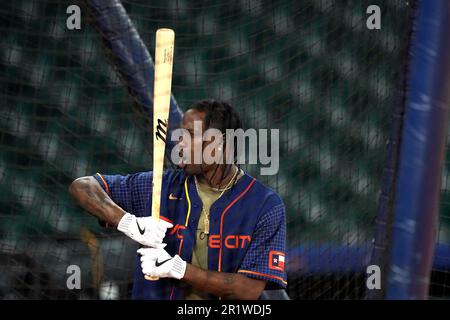 Houston rapper Travis Scott waits to hit during batting practice before a baseball  game between the Chicago Cubs and Houston Astros Monday, May 15, 2023, in  Houston. (AP Photo/David J. Phillip Stock