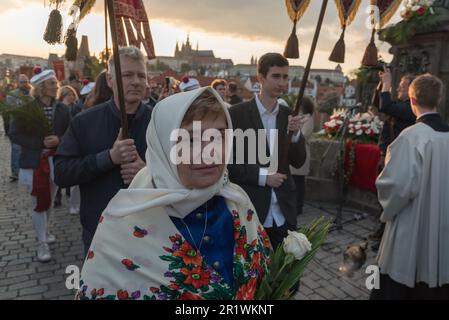 Prague, Czech Republic. 15th May, 2023. Moravian woman dressed in national costumes attends the Navalis celebrations on the Charles bridge in Prague. Navalis Saint Johns celebrations take place to commemorate Czech saint and Prague native, Saint John of Nepomuk, patron of all people of the water. Credit: SOPA Images Limited/Alamy Live News Stock Photo